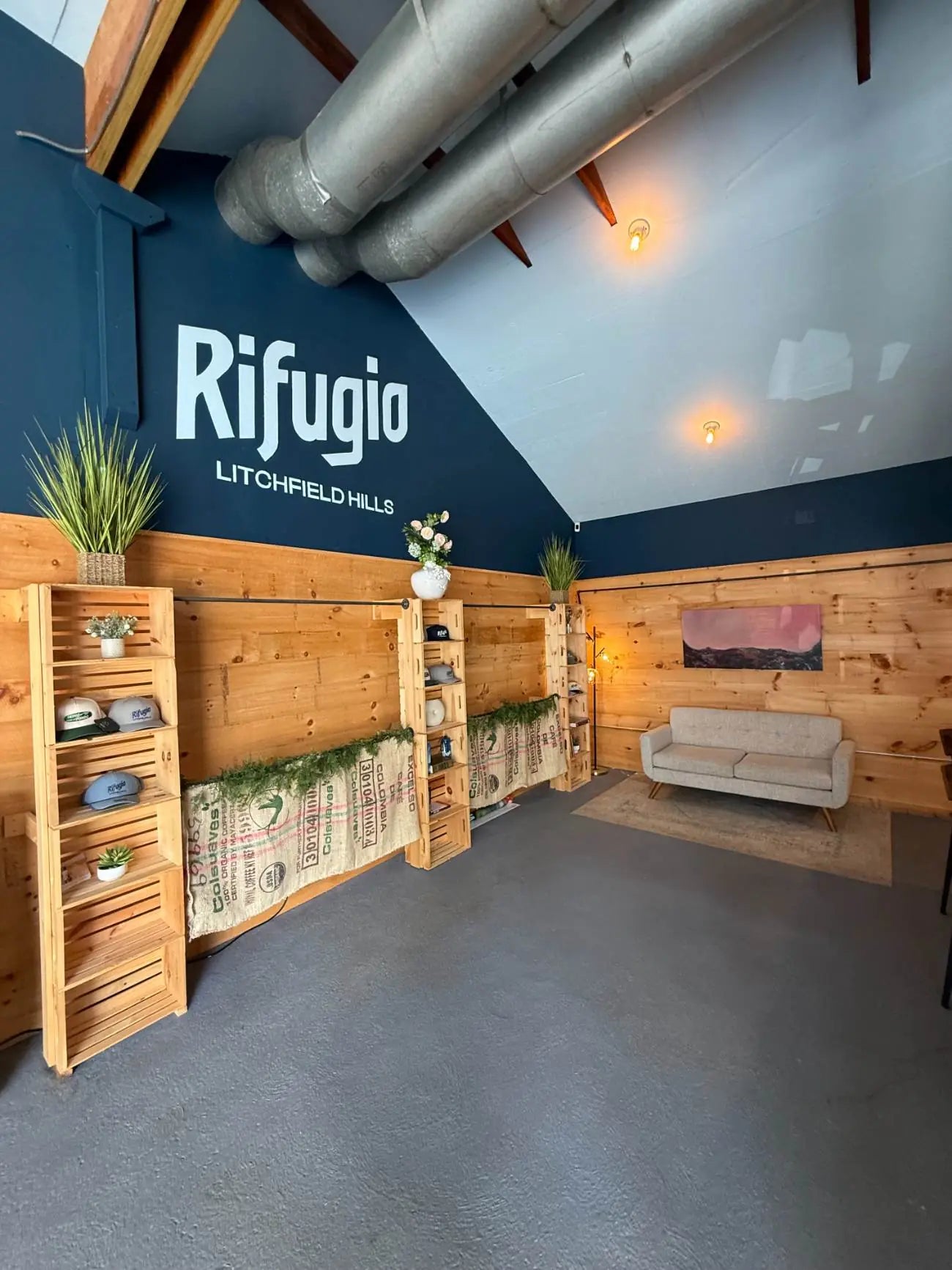 Retail shelves and bike stands inside the Rifugio Litchfield Hills shop