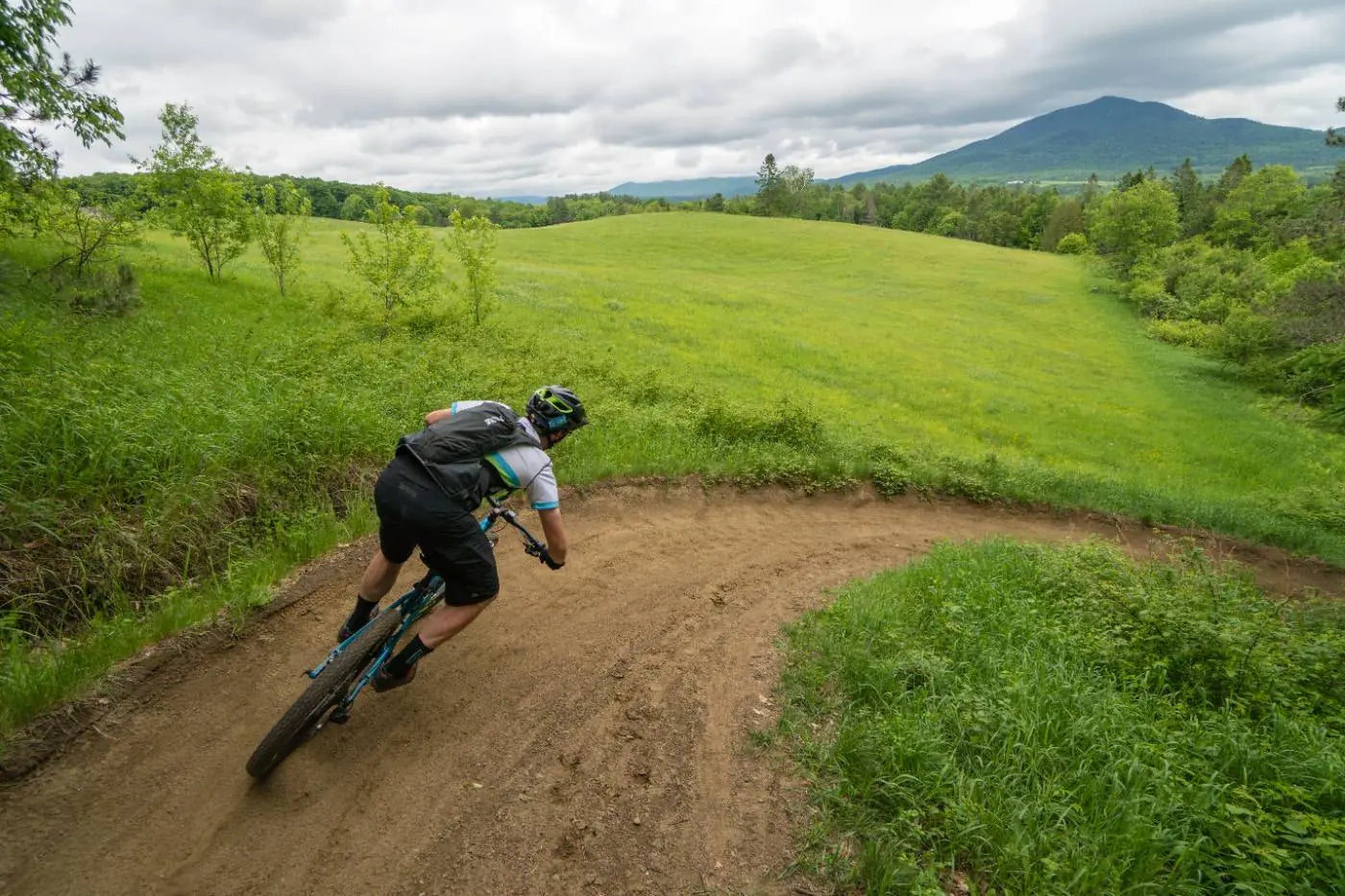 Riders on singletrack at Kingdom Trails, Darling Hill, Vermont